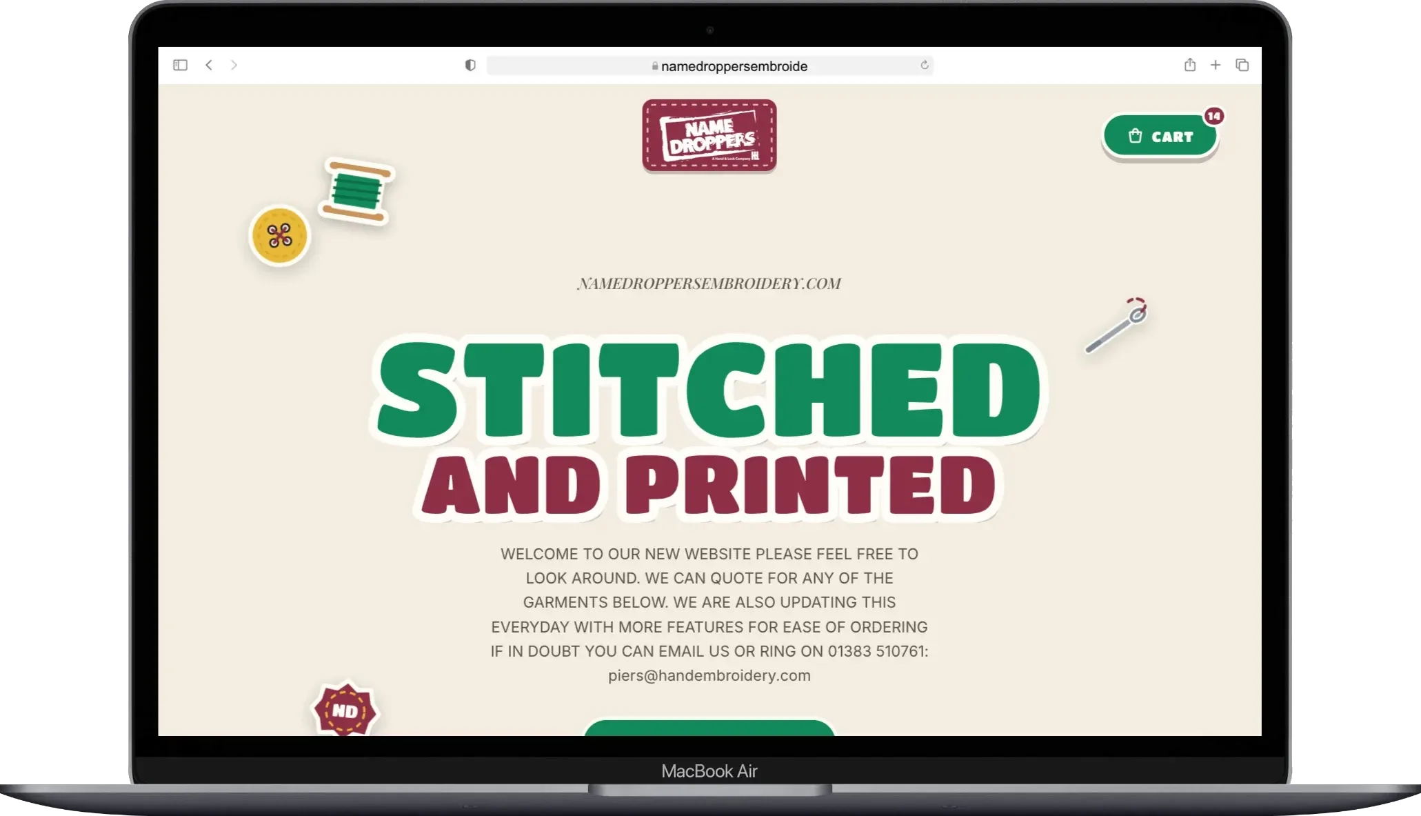 The NameDroppers Embroidery store homepage on a laptop